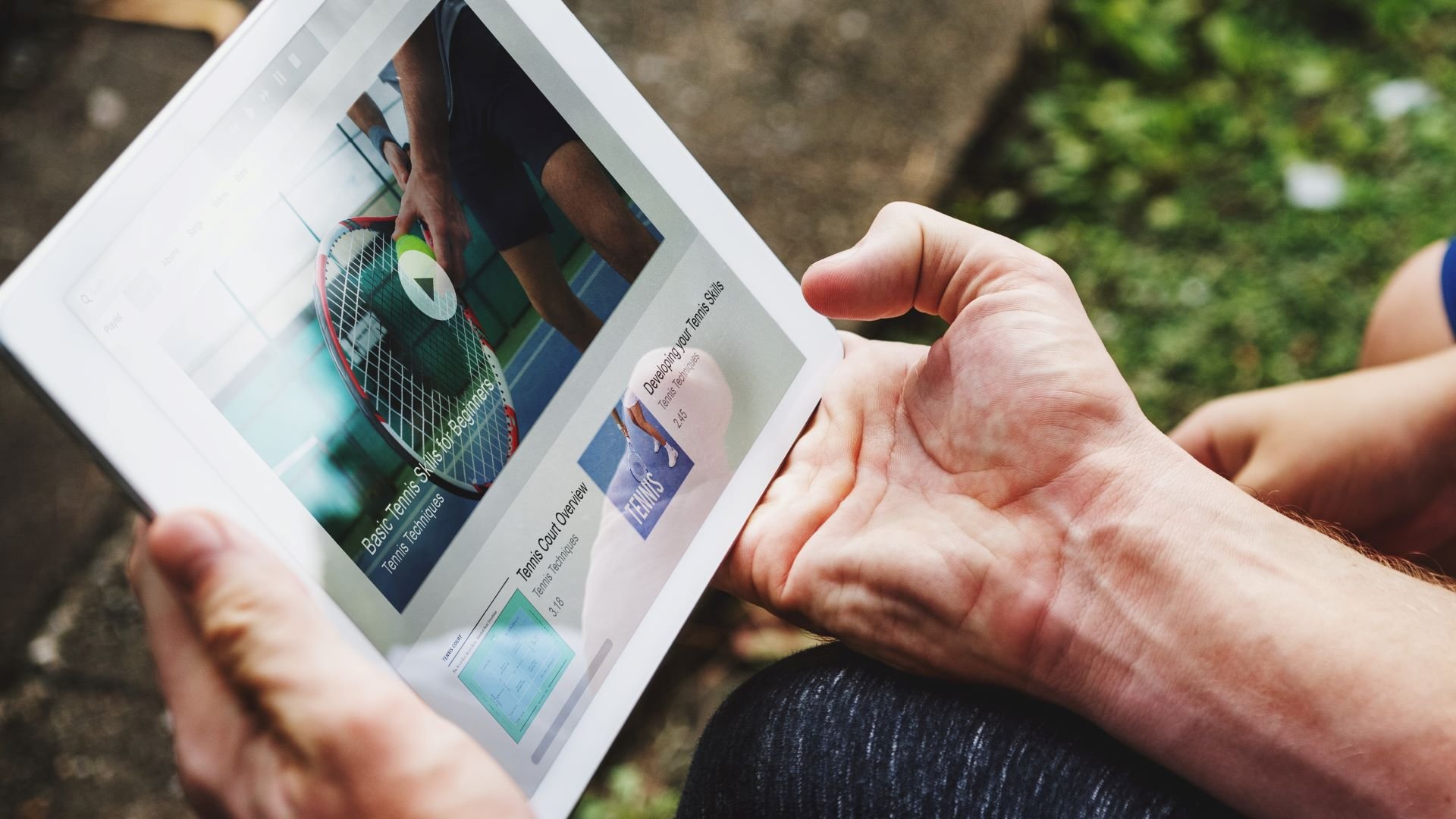 Customers watching tennis marketing videos on an iPad