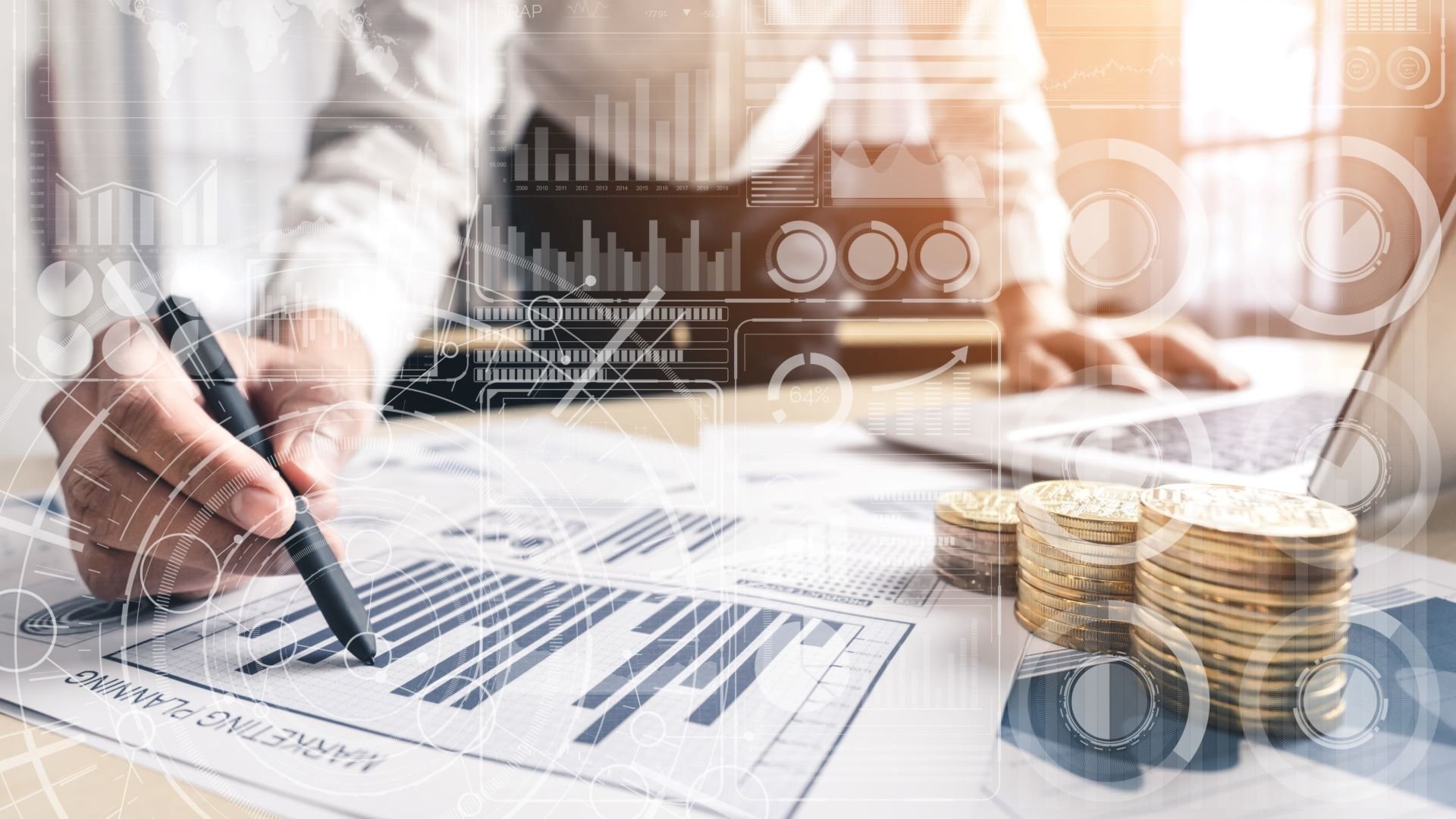 Business owner planning an inbound marketing strategy with growth charts