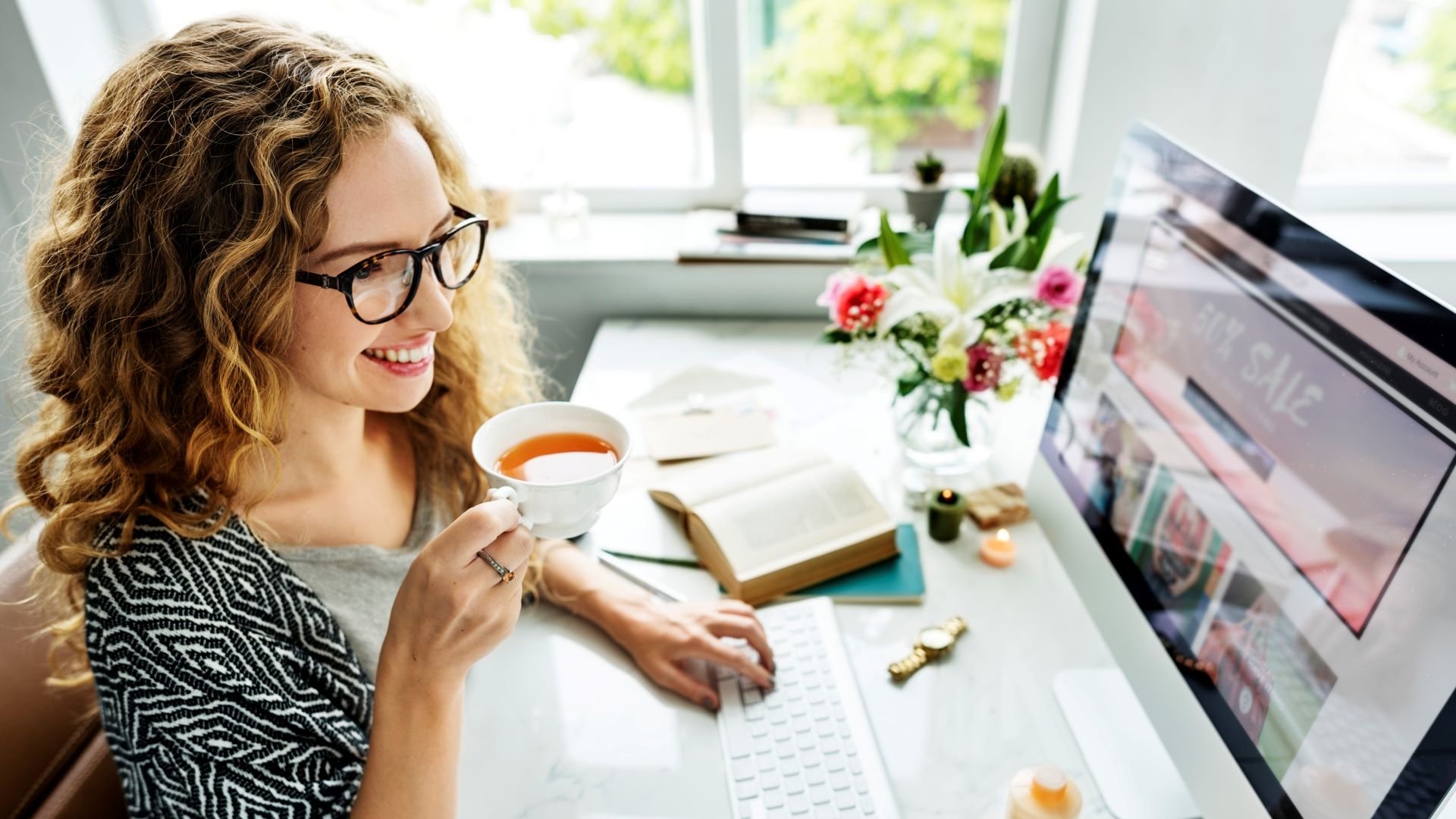 Customer shopping on a growing website in her home office